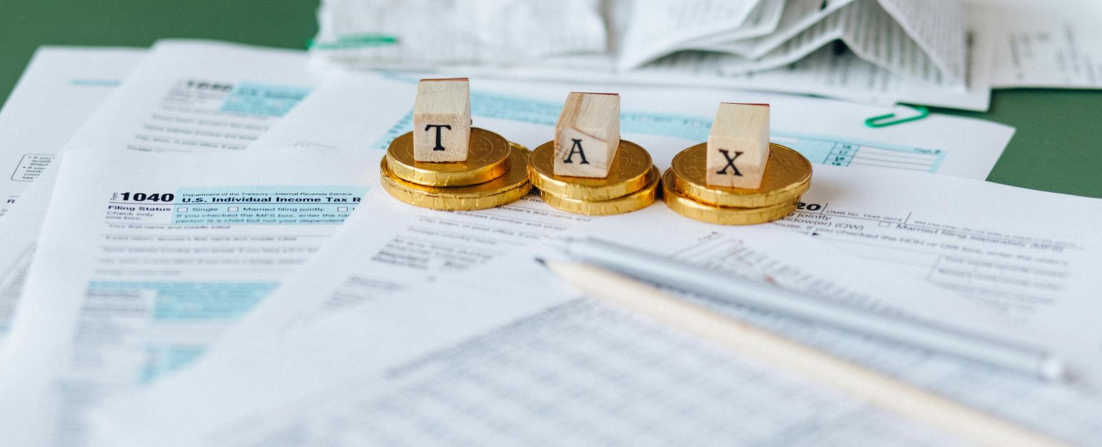 Capital Gains Tax 2026 [Rates, Rules & Strategies to Minimize What You Owe]